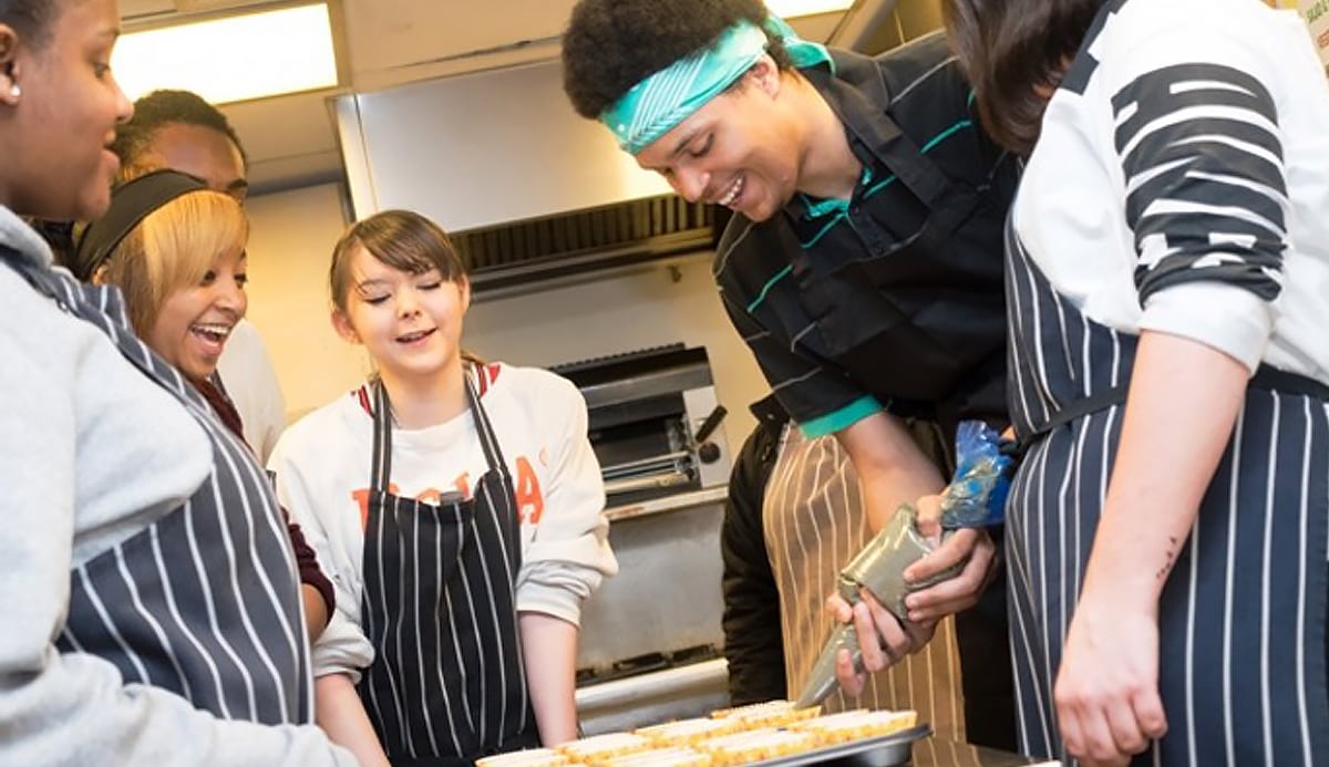 Children enjoying a cookery class, at Howard House School